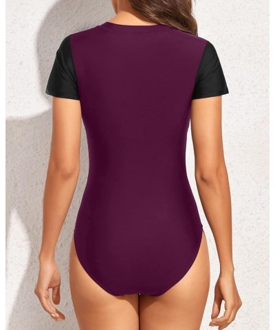 Womens Short Sleeve Rash Guard One Piece Swimsuit Zip Up Bathing Suit Surfing Swimwear UPF 50+ Black and Purple $22.13 Swimsuits