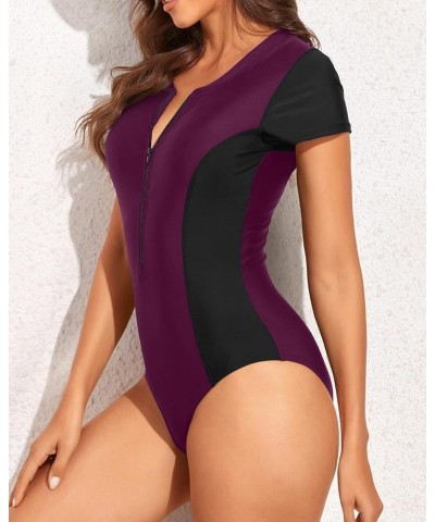 Womens Short Sleeve Rash Guard One Piece Swimsuit Zip Up Bathing Suit Surfing Swimwear UPF 50+ Black and Purple $22.13 Swimsuits