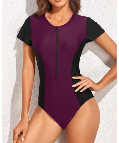 Womens Short Sleeve Rash Guard One Piece Swimsuit Zip Up Bathing Suit Surfing Swimwear UPF 50+ Black and Purple $22.13 Swimsuits